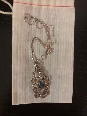 Silver Geometric Pendant with Blue Stone Designed by Hagit Gorali.